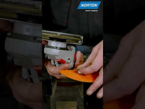 Part of a video titled How to Mount a Fibre Disc on an Angle Grinder | Norton Abrasives