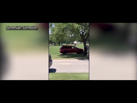 Caught on Camera: Woman jumps curb, drives across graves to escape traffic