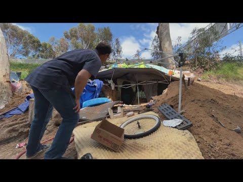 Shelter carved into side of freeway causing concern