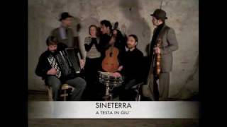 SINETERRA-A testa in giu`