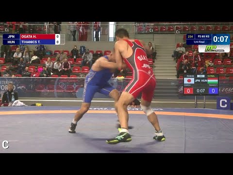 1/4 FS - 69 kg: T. TIHANICS (HUN) df. H. OGATA (JPN) by TF, 11-0