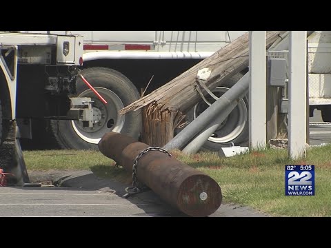 Storm clean up utility truck took down two poles on Main Street in Monson