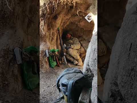 Ukrainian soldiers barely avoid Russian bomb as they hide in a trench