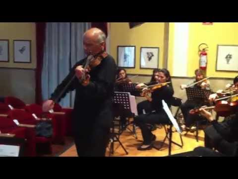 Luigi De Filippi rehearsing on themes from operas with the Cilea String Ensemble