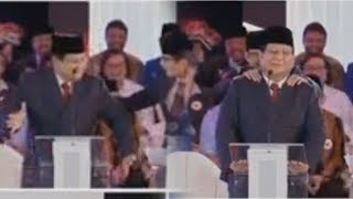 Video Debat Capres Perdana Memanas, Prabowo Joget di Atas Panggung lalu Dipijit Sandiaga