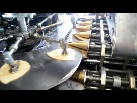 Sugar rolled cone baking machine