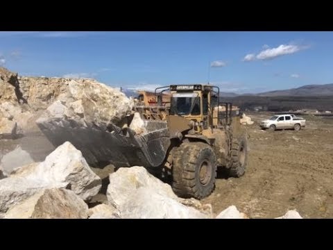 Caterpillar 988B Wheel Loader Loading Dumpers And Caterpillar 385C  With Hydraulic Hammer