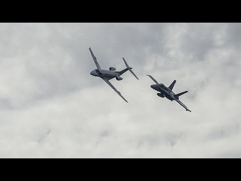 Swiss Air Force F/A-18 intercepts Pilatus PC 24 Jet