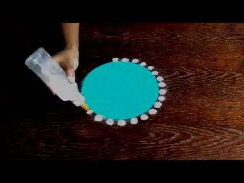 Simple free hand rangoli using bottle Video