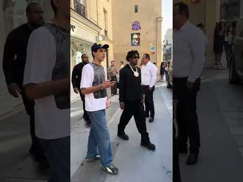 NBA YoungBoy, Mellow Rackz, and model Polska seen out and about in the streets of Paris.