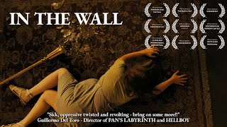 Download the video "IN THE WALL | Award Winning Horror Short Film"