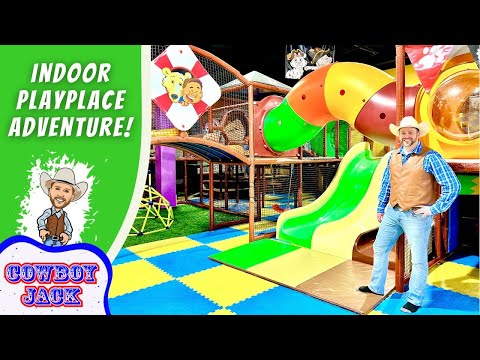 Cowboy-themed indoor play area with a man in cowboy gear beside a bright slide and colorful safety mats; text reads 'Indoor Playplace Adventure'.