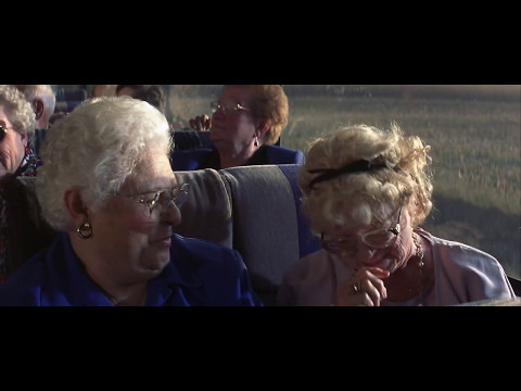 The old man drove his lawn mower he reconstructed on the road