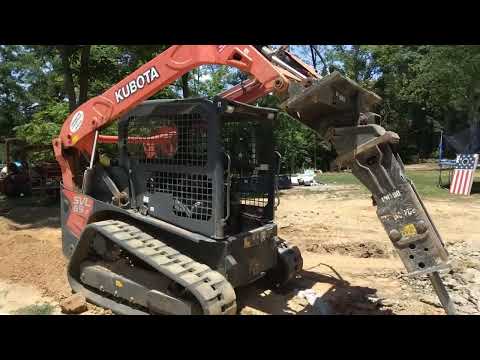 breaking up granite with skidsteer jackhammer #diy