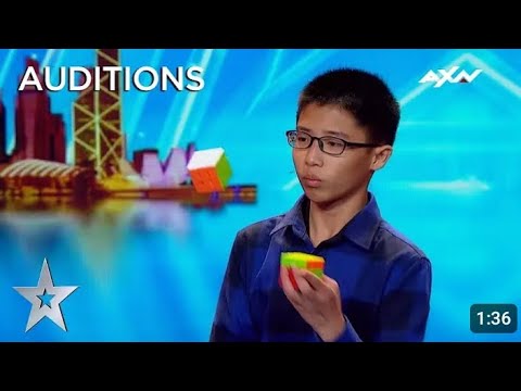 He JUGGLED and SOLVED 3 Rubik's cubes! - Guinness World Records