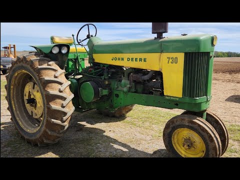 John Deere 2 cylinder 30 series farm tractors work the field!
