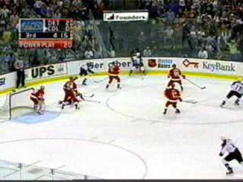 Chris Chelios cross-checking Mike Keane five times