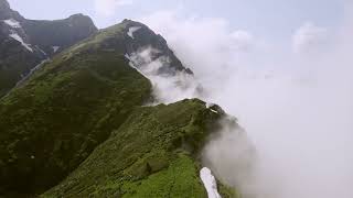 Dronw flying over the Mountain Peak