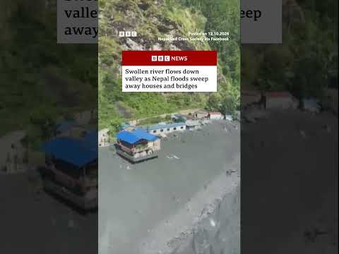 Swollen river flows down valley as Nepal floods sweep away houses and bridges. #BBCNews