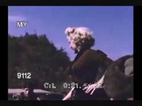 Rare Colour Footage Of Marilyn Monroe Posing  Around Army Jeep In Korea 1954