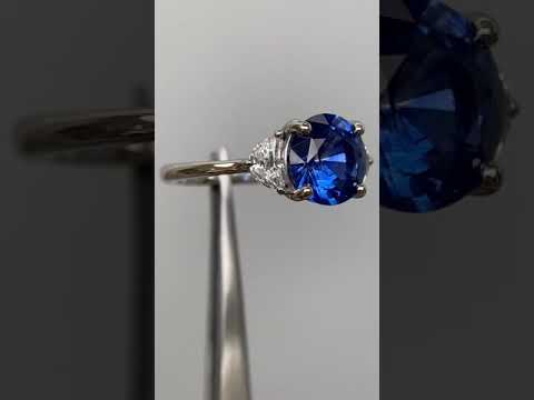 Royal blue Ceylon sapphire diamond ring Platinum in sunlight