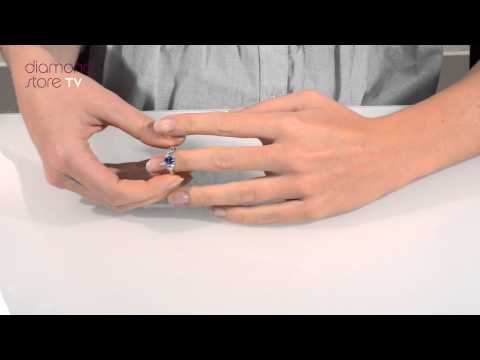 FET23 UY - Sapphire 0.80ct And Diamond 0.50ct 18K White Gold Ring