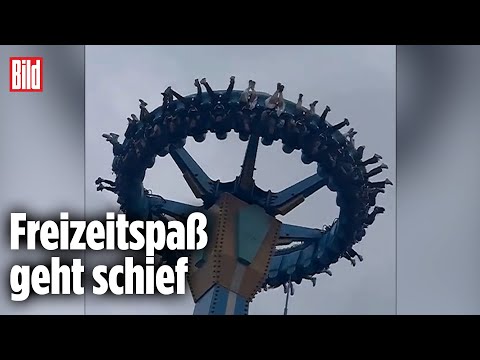 Karussell-Gäste in China stecken kopfüber in der Falle