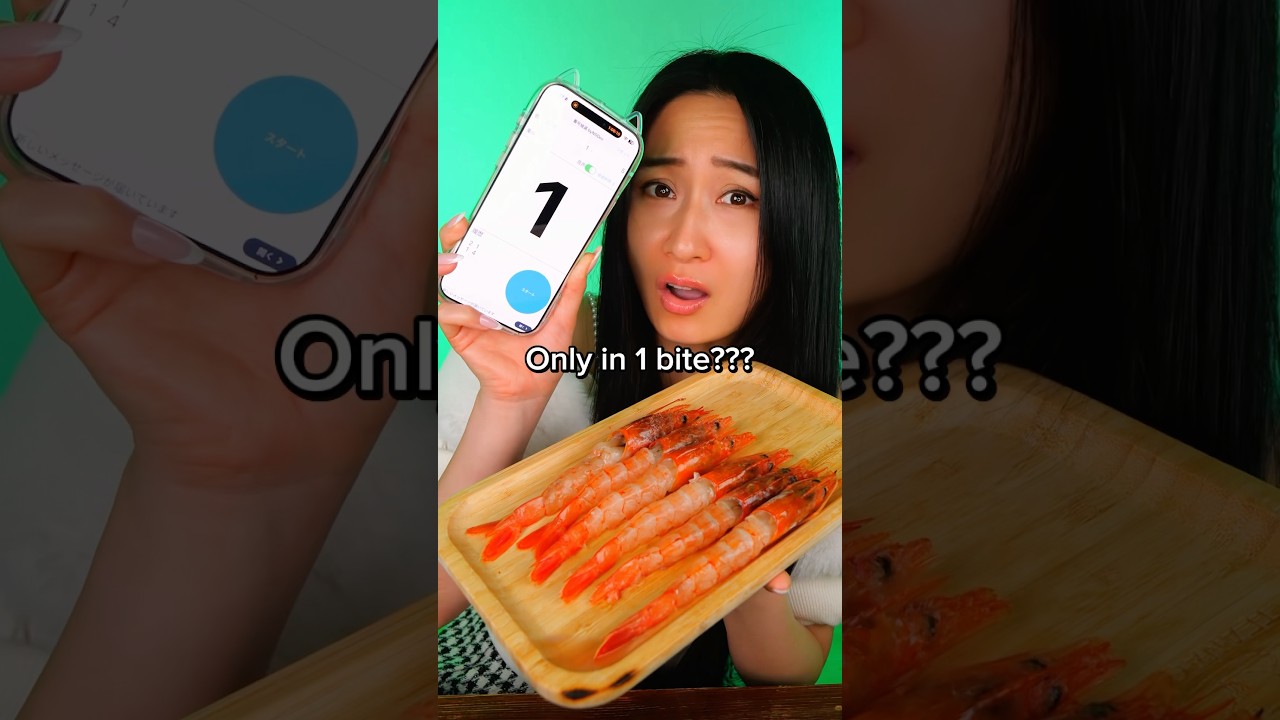 Eat raw shrimp & crape cake in __ bite!