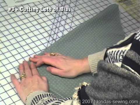 Londa Demonstrates How To Fold Fabric to cut Long Strips of Bias