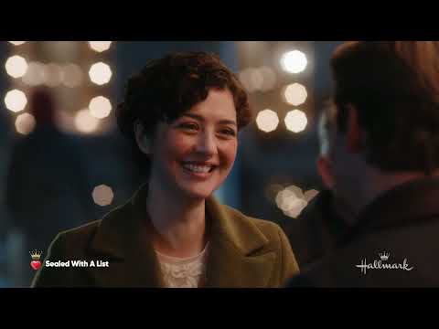 Hallmark preview still: Carley and Wyatt framed by Christmas lights in Sealed with a List
