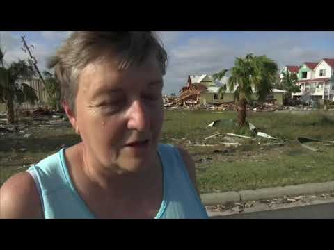 A woman searched for a missing friend who did not evacuate from Mexico Beach, Florida, while others surveyed the damage to their lives and belongings in the aftermath of Hurricane Michael. (Oct. 11)
