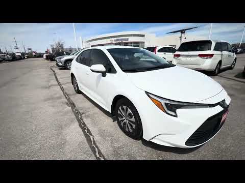 2025 Toyota Corolla Hybrid LE CVT AWD in White for sale at Stouffville Toyota in Whitchurch-Stouffville, ON