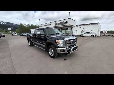 2016 Ford Super Duty F-350 SRW 4WD Crew Cab 6-3/4 Ft Box XLT in Blue for sale at Frontier Chrysler Dodge Jeep Ram Fiat Ltd. in Smithers, BC