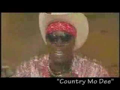 Mista Mo as "Country Mo Dee"