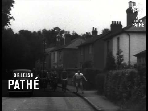 Expanding Children's Clothes (1949)