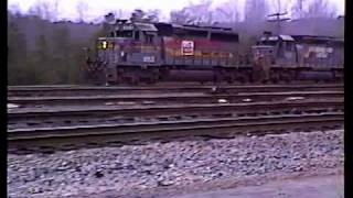 preview picture of video 'CSX coal train cruising quickly by Bostic Yard. (1991)'