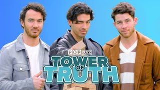 Jonas Brothers vs. &#39;The Tower Of Truth&#39; | PopBuzz Meets