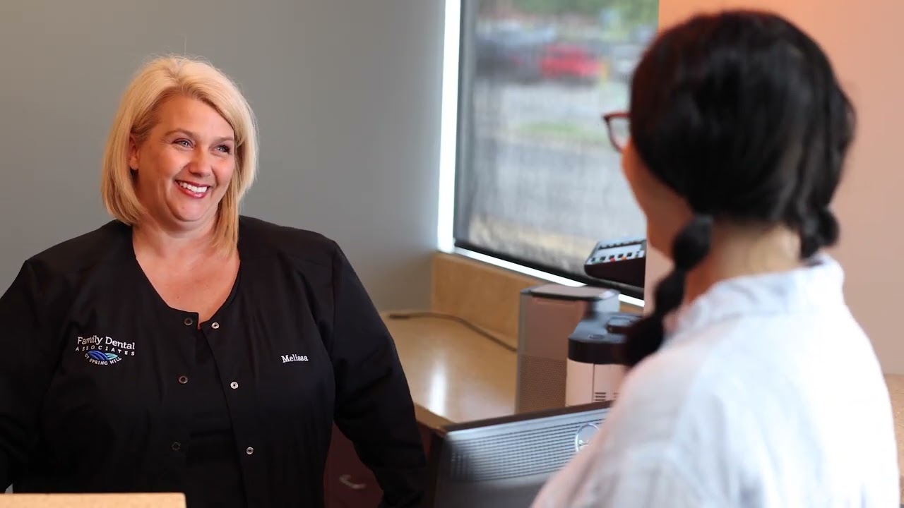 Spring Hill dental team member smiling at a patient