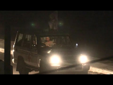 Released hostages seen aboard Red Cross convoy driving through Rafah crossing | AFP