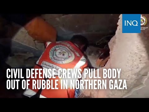 Civil Defense crews pull body out of rubble in northern Gaza