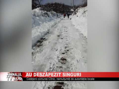 Cetatenii din satul Pinoasa , comuna Cilnic au deszapezit singuri drumul pe Vezuroi