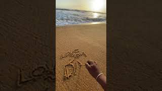 love you dad written in sand beach
