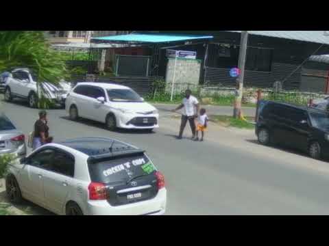 Caught on Cam: A Parent's Worst Nightmare - Driver Nudges Parent with Child