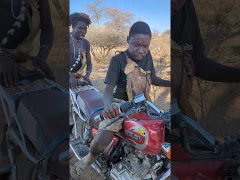 chaba trying to ride motorcycle