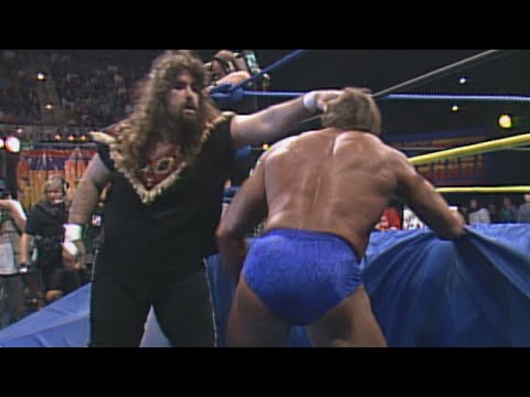 Cactus Jack brutalizes Paul Orndorff in a Falls Count Anywhere Match: WCW SuperBrawl III