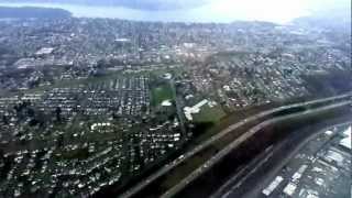 preview picture of video 'Victoria-to-Seattle flight: northbound takeoff & southbound landing on cloudy winter day 2013-02-06'