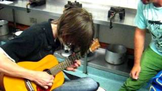 Baby guitar duel in a Corkitchen