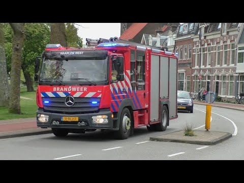 Tankautospuit Haarlem West 12 3030 met spoed onderweg naar een Brandgerucht in Haarlem