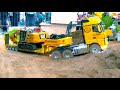 BEST OF RC TRUCKS AT THE CONSTRUCTION SITE / RC FAIR GERMANY / MB ACTROS HUIAN - TAMIYA - KABOLITE