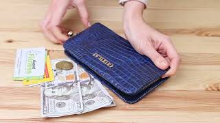 Гаманець жіночий шкіряний з тисненням під екзотику Guxilai 18963 синій